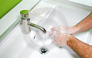 Man washing his Hands to prevent virus infection and clean dirty hands