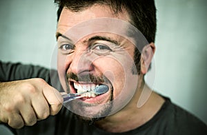 Man washing his teeth