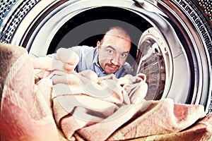 Man and washing machine