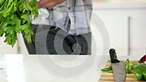 Man washing vegetables