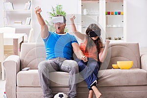 The man watching football on virtual reality vr glasses
