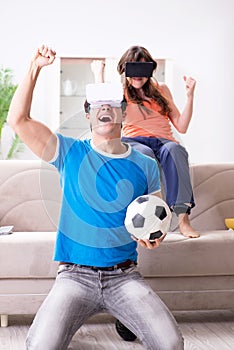 The man watching football on virtual reality vr glasses