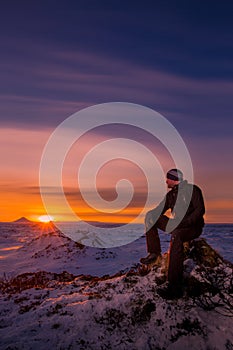 A man watching the sunset