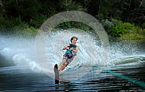 Man water skiing on lake