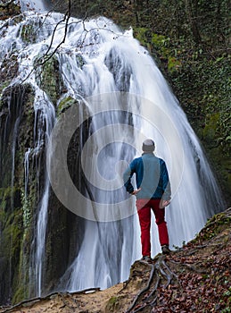 Man in the waterfalls of Corraladas in Gorbeia Natural Park photo
