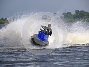 Man on WaveRunner on the water