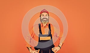 man wear boilersuit. bearded worker in overalls. Confident Mature Mechanic. Portrait Of Repairman. Worker in storehouse