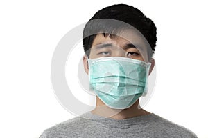 A man wear breathing medical respiratory mask against the Coronavirus & x28;CoVID-19& x29; isolated on white background