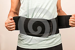 Man wearing a Back Brace for his injured back