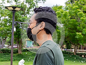 Man wearing black glass and nature