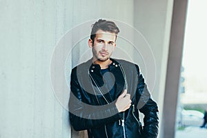 Man wearing black leather jacket