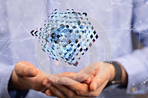 Man wearing a business shirt holding out his hands to demonstrate cloud technology