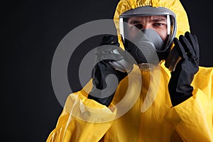 Man wearing chemical protective suit on background, closeup. Virus research