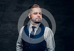 A man wearing classic waistcoat and slim bow tie.