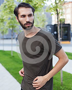 Man wearing dark grey t-shirt
