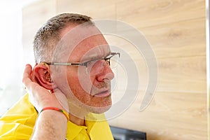 Man wearing deaf aid
