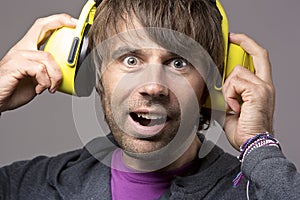 Man wearing earmuff