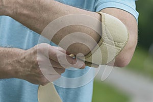 Man wearing elbow brace