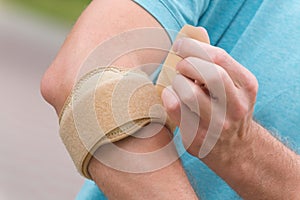 Man wearing elbow brace