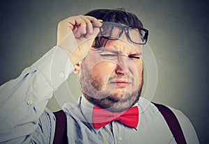 Young grumpy man in detestation