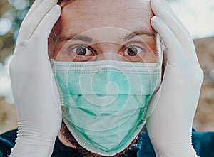 Man wearing face mask and gloves to prevention of contamination, outdoor