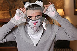 Man wearing funny cat costume