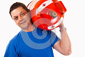 A man wearing a gas cylinder on his shoulder