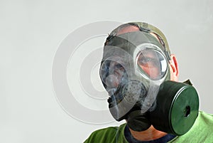 Man wearing a gas mask to avoid second hand smoke