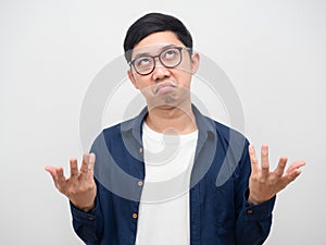 Man wearing glasses feeling bored show hand up white background