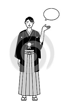 Man wearing Hakama with crest giving directions, with a wipeout