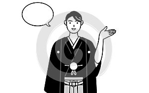 Man wearing Hakama with crest giving directions, with a wipeout