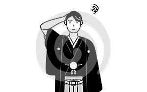 Man wearing Hakama with crest scratching his head in distress