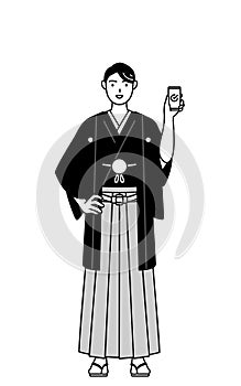 Man wearing Hakama with crest using a smartphone at work