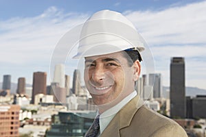 Man Wearing Hard Hat Against Urban City