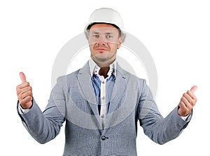 Man wearing a hardhat cheering in jubilation