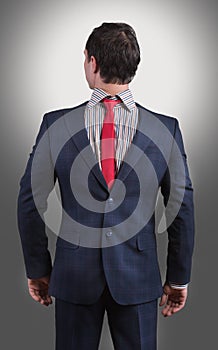 Man wearing his suit on backwards