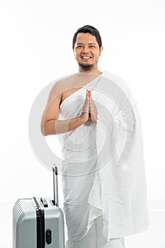 Man wearing ihram muslim clothes for hajj and umrah