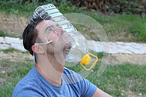 Man wearing improvised coronavirus face shield