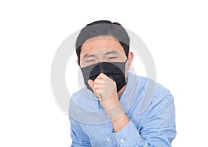 Man wearing a mask coughs vigorously in front of a white background