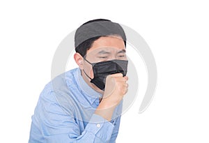 Man wearing a mask coughs vigorously in front of a white background