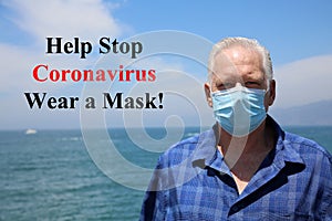 Man wearing a paper mask on his face. A man wears a Medical Face Mask to help avoid contracting Coronavirus aka Covid-19. Covid-