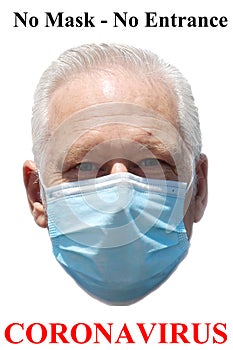 Man wearing a paper mask on his face. A man wears a Medical Face Mask to help avoid contracting Coronavirus aka Covid-19. Covid-