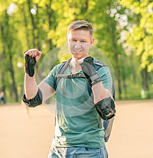 Man wearing protection for active sport smiling