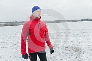 Man wearing protective sport jacket before his winter training session