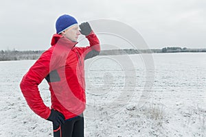 Man wearing protective sport jacket starting his winter training session