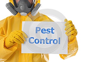 Man wearing protective suit holding sign PEST CONTROL on white background