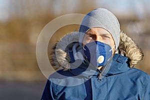 Man wearing protestion mask on the street, protection against corona virus