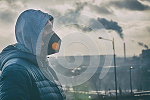 Man wearing a real anti-pollution, anti-smog and viruses face mask