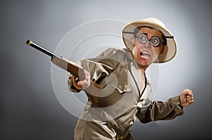 The man wearing safari hat in funny concept