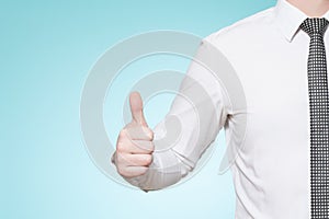 Man wearing shirt and tie thumbs up